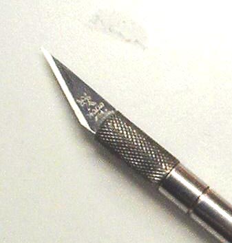  Close up of an Exacto knife blade.