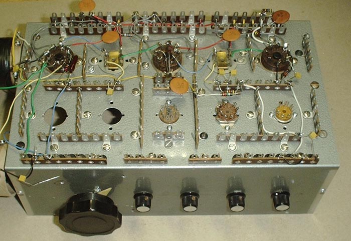 A really practical new old style breadboarding system using terminal strips in conjunction with tube sockets mounted upside down on an aluminum chassis.