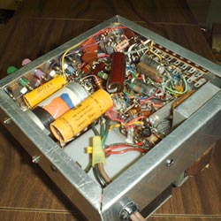 Photo of the unit turned upside down to show the under side of the chassis.  There is hardly room for a fly to crawl into it.